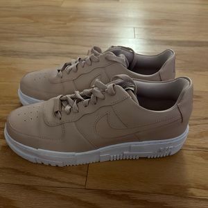 Light pink women’s nike air force one’s